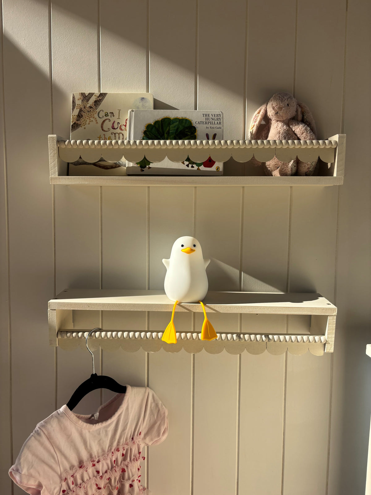 White scalloped shelves