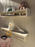 White scalloped shelves